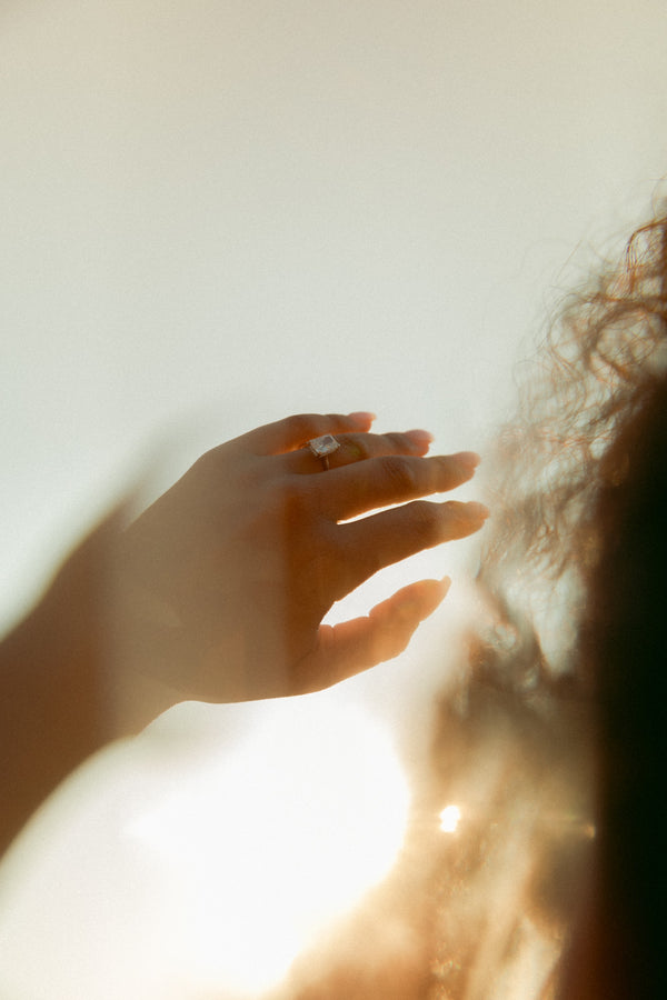 Hand with a diamond ring