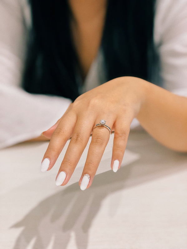 bride wearing diamond ring